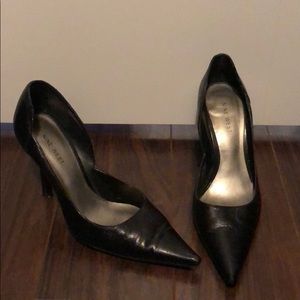 Black pointy toe pumps